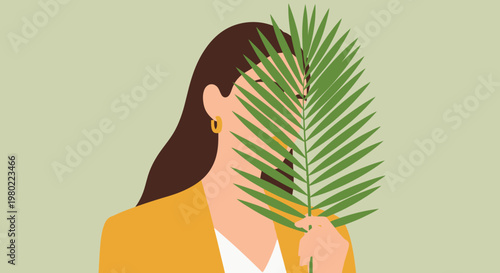 A woman in an orange jacket partially obscured by large vibrant green palm leaves