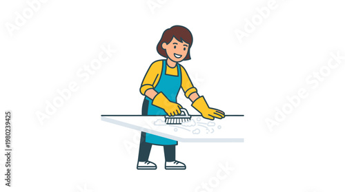 Woman wearing blue apron cleaning surface.