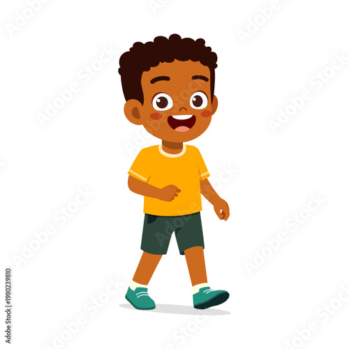 Happy Smiling African American Boy Walking Forward Wearing Yellow T-shirt and Green Shorts Cheerful Mood