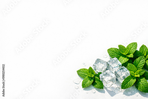 Fresh green mint leaves with clear frozen water cubes on white background, cooling herb arrangement, icy botanical element, summer refreshment concept.