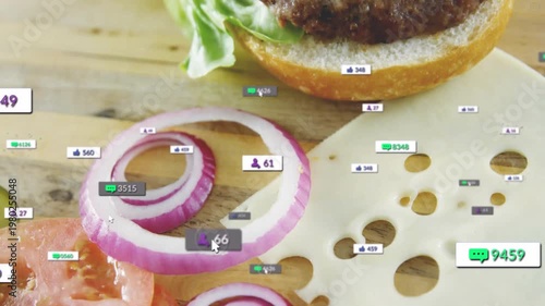 Vertical video: Burger reacting to cursor hovering, badges rising over onion and tomato for food ad