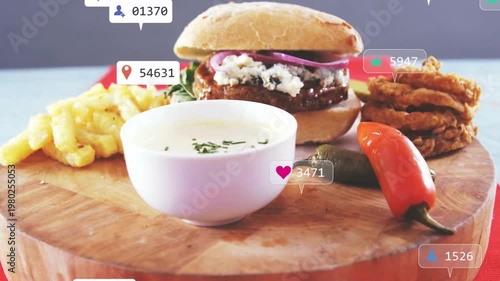 Top-left badges floating in, plated burger meal accumulating engagement icons, showing popularity