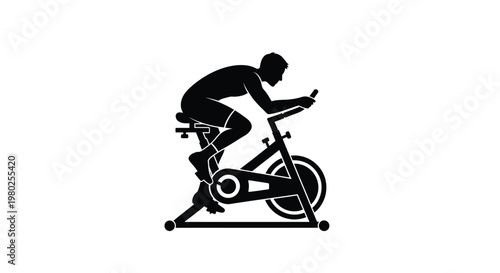 A silhouette of a man intensely riding an exercise bike showcasing fitness and athletic activity