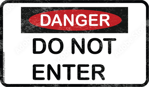 A warning sign indicating danger and prohibiting entry to an area
