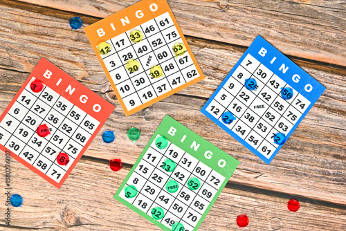 Canvas Print Retro style bingo game cards on a rustic wooden table