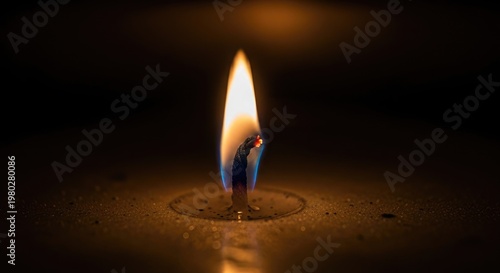 Burning Candle Flame in Dark Room.