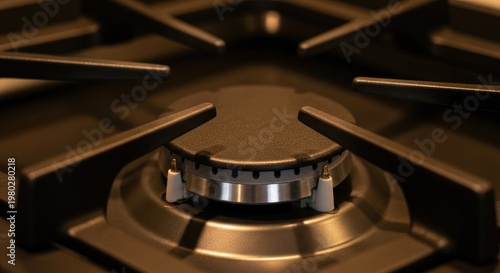 Close-up of a modern gas stove burner.