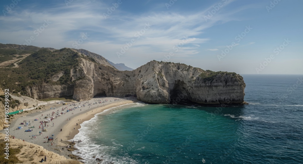 Obraz premium Rock formations with caves beside the sea