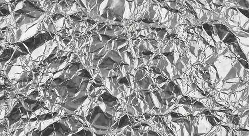 Crumpled aluminum foil texture background with abstract metallic reflections pattern