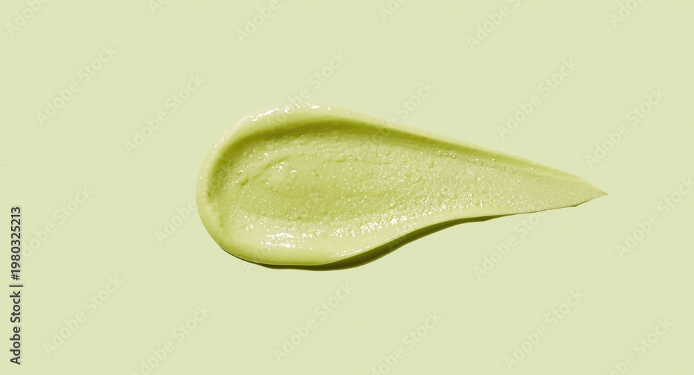 Fototapeta premium cosmetic clear gel balm swiped on light olive green minimal backdrop