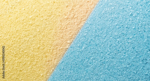 Studio light sponge grain background with yellow pink and blue vibrant color combination