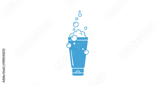 A blue glass with bubbles rising.