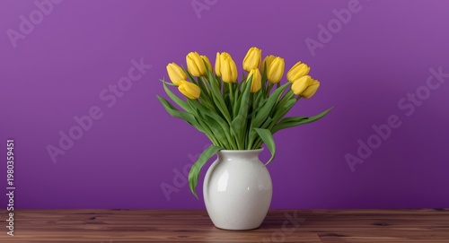 Yellow tulips arranged in a ceramic vase on a wooden table with a vibrant purple background