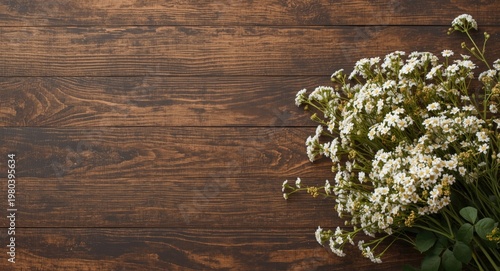 Elderflower floral arrangement on handcrafted wooden panel with copy space