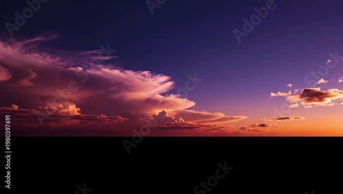 Wallpaper Mural Dramatic sunset sky with vibrant colorful clouds over dark horizon Torontodigital.ca