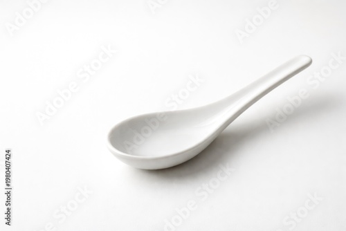 White ceramic spoon resting...