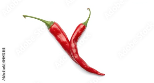Long red chili pepper showcased on a minimalistic white backdrop