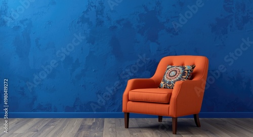 Orange armchair with colorf...
