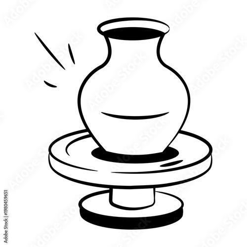 Drawing style icon depicting a pottery wheel