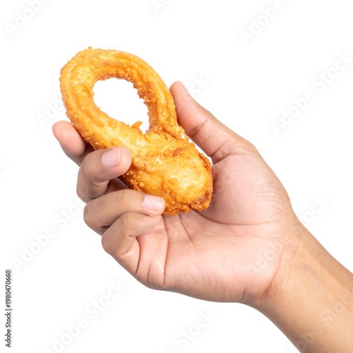 Hand Holding a Delicious Golden Fried Dough Snack Pastry