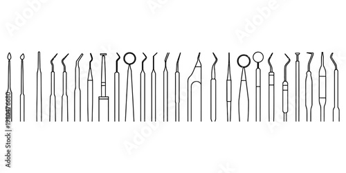 A collection of various dental instruments displayed in a line against a plain white background.