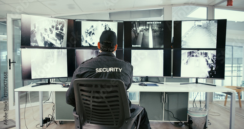 Fotografie Man, security guard and monitor in control room for safety, back or display for video analysis job