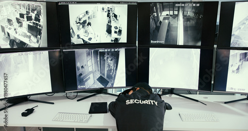 Photos Woman, security guard and sleep with monitor for surveillance, tired and exhausted with overtime