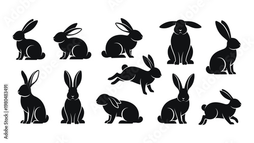 A collection of black silhouette rabbits in various poses and orientations