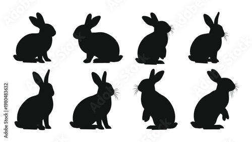 Collection of black rabbit silhouettes in various sitting and alert poses