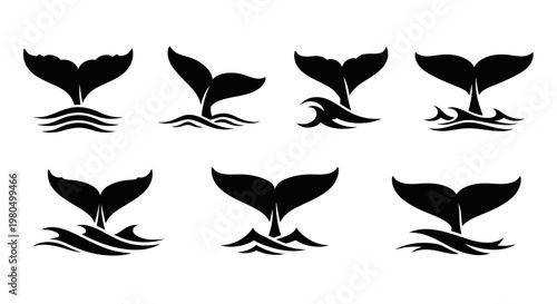 Set of black whale and dolphin tail silhouettes with waves