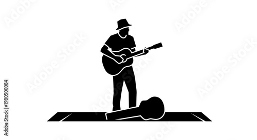 Man playing guitar on stage.