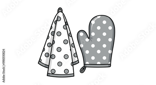 Set of coordinated kitchen accessories features a white towel with grey polka dots and a matching padded oven mitt.