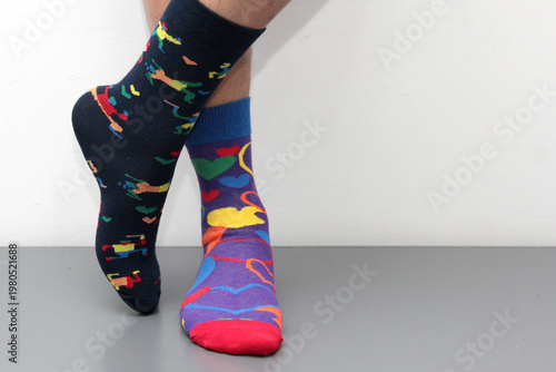 Mismatched socks to commemorate World Down Syndrome Day, raising awareness about diversity and inclusion, symbolizing differences