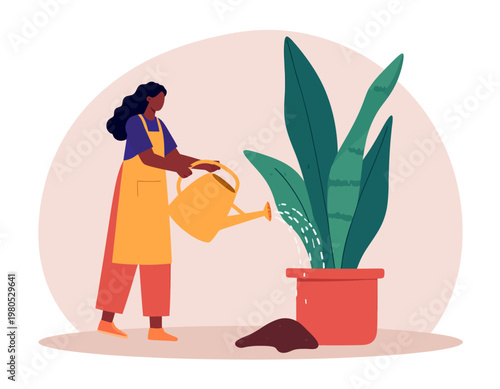 A woman in an apron watering a large green potted plant with a yellow watering can, engaging in a gardening hobby.