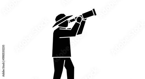 Man looking through a telescope.