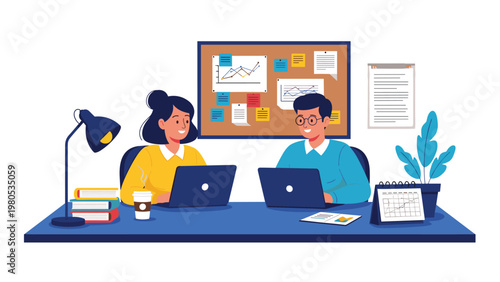 Colleagues working on laptops at a shared desk with a bulletin board full of notes and charts in the professional office.