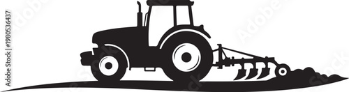 Black silhouette of tractor plowing