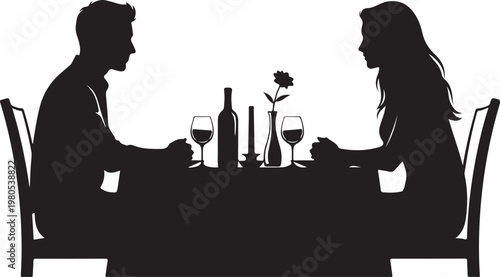 Silhouette of couple dining at