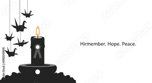 A memorial candle with paper origami cranes symbolizing remembrance hope and peace.