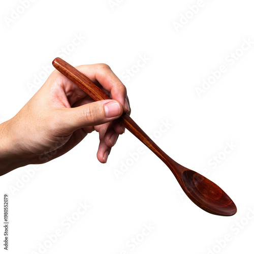 Male hand holding a wooden spoon isolated on white background with clipping path.	

