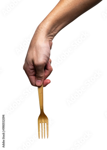 Male hand holding a gold plastic fork isolated on white background with clipping path.	
