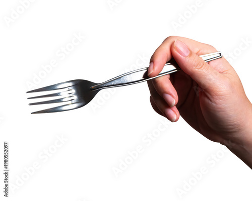 Female hand holding a black plastic fork isolated on white background with clipping path.	
