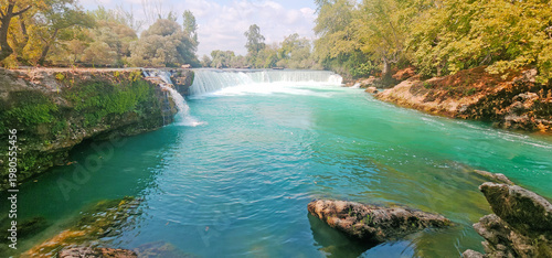 Scenic view of Manavgat Waterfall with turquoise water and lush nature in Antalya, Turkey