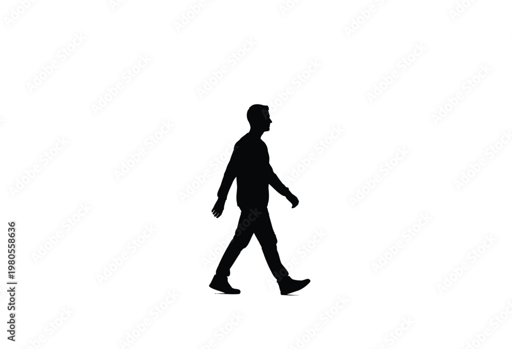 Obraz premium A solitary man is captured walking forward in a striking dark silhouette