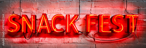Glowing Red Neon Snack Fest Sign Mounted on White Painted Brick Wall