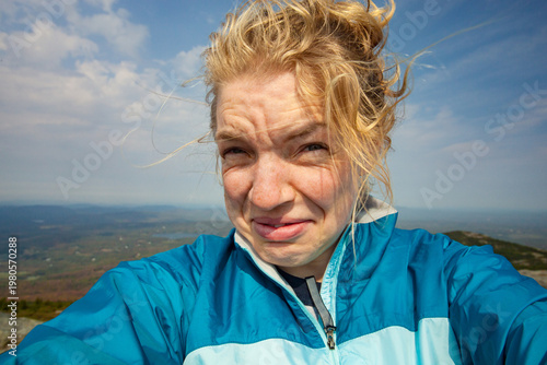 Selfie of a young blond caucasian woman atop Mount Monadnock