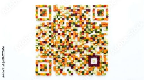 Small pieces of fruit and vegetable made into a QR code on a flat white surface for a fun display