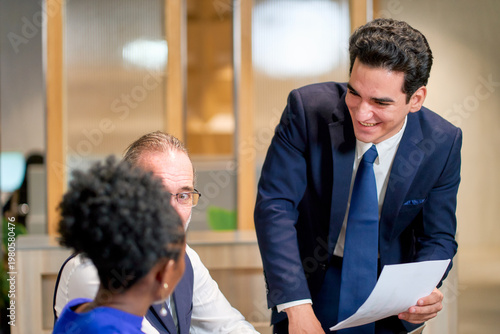Group of business team working in co-working space office with document paper.