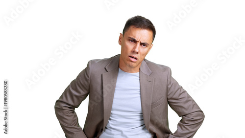 Canvas Print Businessman looking confused and frustrated, posing with hands on hips