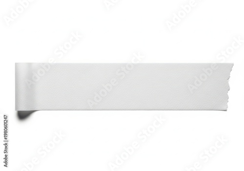 A roll of white paper with a torn edge on a plain background